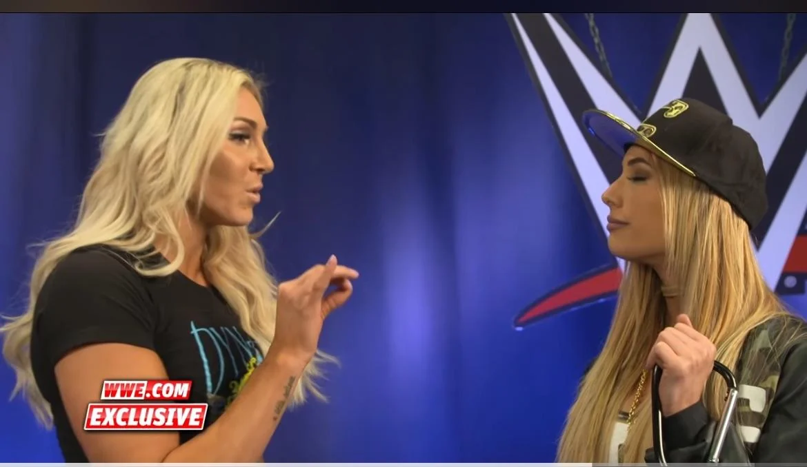 charlotte-flair-and-carmella-v0-ysh4x3my1m7d1.webp