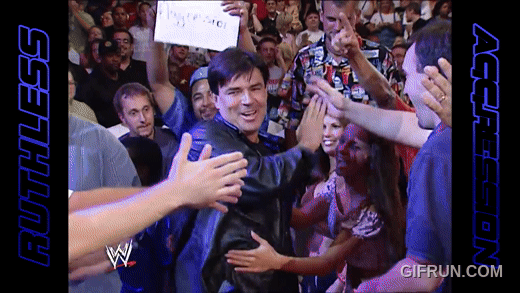 Eric_Bischoff_takes_a_front_row_seat__SmackDown_2002 (1).gif