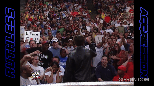 Eric_Bischoff_takes_a_front_row_seat__SmackDown_2002 (3).gif