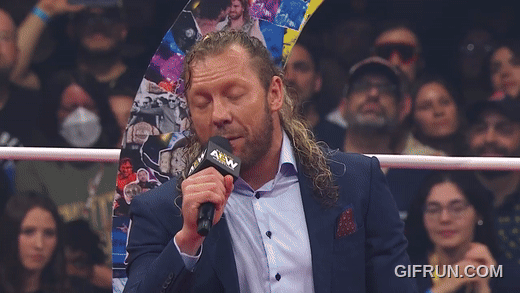 Kenny_Omega_gets_his_NEW_AEW_World_Championship_from_Young_B (3).gif