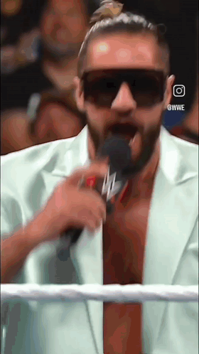 seth-rollins-mic-1.gif