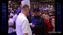 Eric_Bischoff_takes_a_front_row_seat__SmackDown_2002 (2).gif