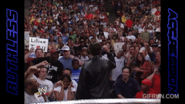 Eric_Bischoff_takes_a_front_row_seat__SmackDown_2002 (3).gif