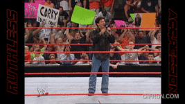 Eric_Bischoff_brings_Triple_H_to_RAW__WWE_RAW_2002_1 (1).gif