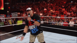 The_Rock_and_John_Cena_engage_in_a_WrestleManialevel_war_of (1).gif