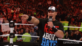 The_Rock_and_John_Cena_engage_in_a_WrestleManialevel_war_of (6).gif