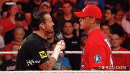 Raw_John_Cena_interrupts_CM_Punks_contract_negotiations.gif