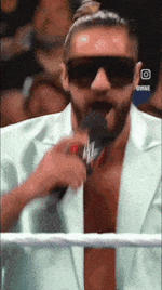 seth-rollins-mic.gif